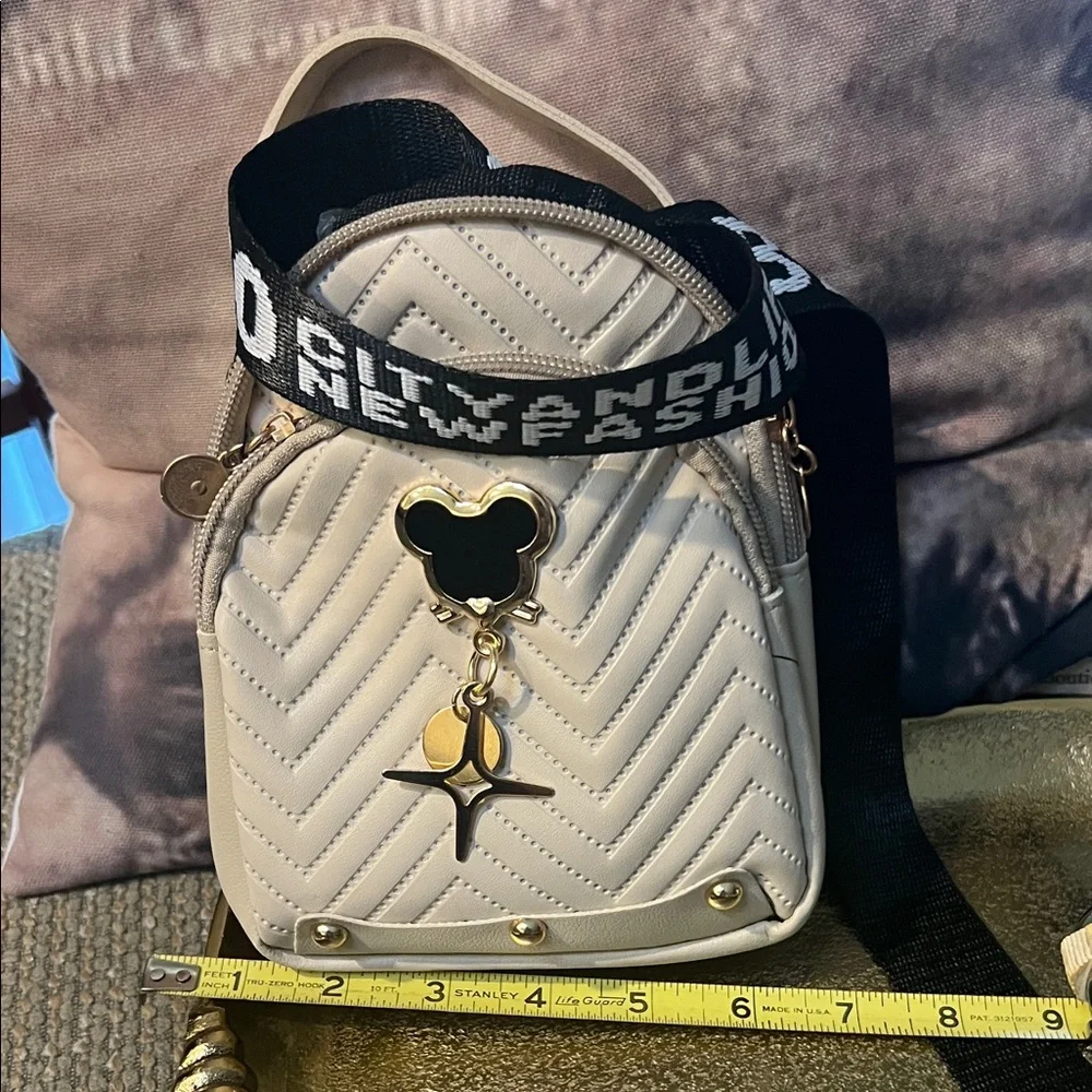 #1345**Stylish Beige Mini Quilted Backpack “47 long” adjustable strap. - Picture 6 of 7